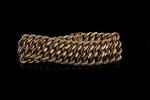 Bracelet en or jaune 18k (750 millièmes) à maille américaine...