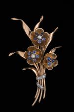 Broche bouquet fleuri en or jaune 18k et gris (750...