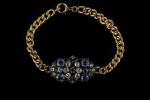 Bracelet en or jaune 18k (750 millièmes) et argent à...