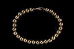 Bracelet boules en or jaune 18k (750 millièmes). 
Long. :...