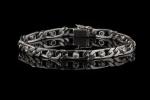 Bracelet à maille cheval en or gris 18k (750 millièmes)...