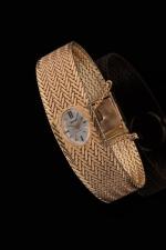 Montre bracelet de dame en or jaune 18k (750 millièmes),...