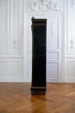 Armoire en marqueterie dite néo-boulle de laiton sur bois noirci....