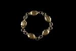 CARTIER. Parure en or jaune et gris 18k (750 millièmes)...