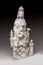 CHINE - XIXe siècle.  
Groupe en porcelaine émaillée blanc...