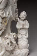 CHINE - XIXe siècle.  
Groupe en porcelaine émaillée blanc...