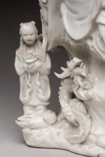 CHINE - XIXe siècle.  
Groupe en porcelaine émaillée blanc...