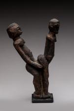 LOBI, BURKINA FASO. "Bêtise".  Sculpture en bois. XXe siècle....