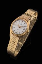 BAUME   MERCIER. 
Montre bracelet de dame en or...