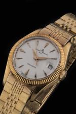 BAUME   MERCIER. 
Montre bracelet de dame en or...