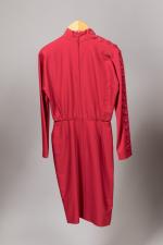 CHRISTIAN DIOR Boutique. 
Robe en laine rouge, manches longues et...