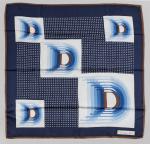 CHRISTIAN DIOR. 
Foulard en soie à décor du monogramme de...