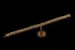 Bracelet à maille américaine en or jaune 18k (750 millièmes)...