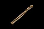 Bracelet à maille américaine en or jaune 18k (750 millièmes)....