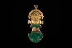 Broche pouvant former pendentif en or jaune 18k (750 millièmes)...