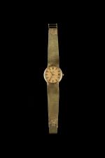 OMEGA. 
Seamaster. 
Montre bracelet unisexe en or jaune 18k (750...