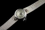 OMEGA. 
Montre bracelet de dame en or gris 18k (750...