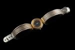 PHILIPPE CHARRIOL. 
Montre bracelet de dame en acier et métal...