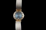 PHILIPPE CHARRIOL.  Montre bracelet de dame en acier et...