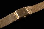 CLUNY. 
Montre bracelet de dame en or jaune 18k (750...