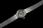 GERMOR.  Montre bracelet de dame en or gris 18k...