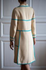 COURREGES Prototypes. 
Robe en laine melangée beige gansée d'un galon...