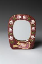 Mithé ESPELT (1923-2020). 
Miroir modèle "Mésange" en céramique émaillée dans...