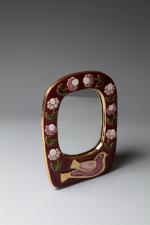 Mithé ESPELT (1923-2020). 
Miroir modèle "Mésange" en céramique émaillée dans...