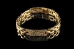 CARTIER. Bracelet en or jaune 18k (750 millièmes) modèle "Tyrana"...