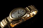 CARTIER.  Montre bracelet de dame en or jaune 18k...