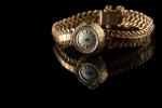 ROLEX. Montre bracelet de dame en or jaune 18k (750...