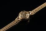 Montre bracelet de dame en or jaune 18k (750 millièmes),...