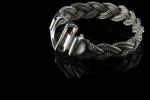 HERMES.
Bracelet en argent à maille tressée et fermoir étrier. Signé....