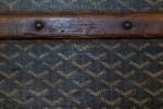 GOYARD.Malle en bois garnie de toile goyardine, les serrures et...