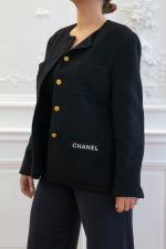 CHANEL. Veste de la ligne "Boutique" en tweed de laine...