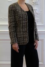 CHANEL. Veste de la ligne "Boutique" en tweed de laine...