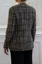 CHANEL. Veste de la ligne "Boutique" en tweed de laine...