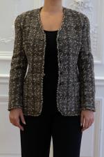 CHANEL. Veste de la ligne "Boutique" en tweed de laine...