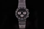 BULGARI.Montre en acier chronographe, le cadran noir figurant les heures...